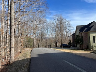 This beautifully wooded .72 acre lot is located in the gated on Chatuge Shores Golf Course in North Carolina - for sale on GolfHomes.com, golf home, golf lot