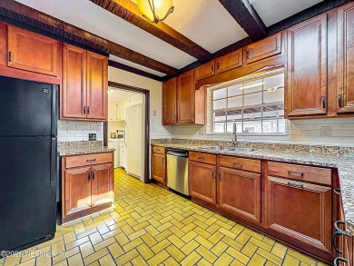Just steps from the prestigious Timuquana Country Club, this on Timuquana Country Club in Florida - for sale on GolfHomes.com, golf home, golf lot