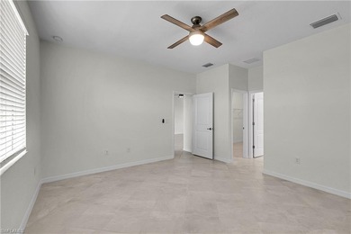 NEED A 3-CAR GARAGE? This contemporary lake view home has 4 on Babcock National Golf Course in Florida - for sale on GolfHomes.com, golf home, golf lot