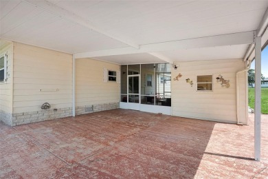 Welcome to this beautifully maintained 2-bedroom, 2-bathroom on Zellwood Station Country Club in Florida - for sale on GolfHomes.com, golf home, golf lot