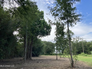 Your Gulf Coast Escape Awaits! Imagine waking up to the sound of on Pass Christian Isles Golf Club in Mississippi - for sale on GolfHomes.com, golf home, golf lot