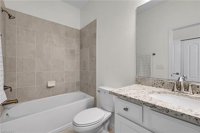 NEED A 3-CAR GARAGE? This contemporary lake view home has 4 on Babcock National Golf Course in Florida - for sale on GolfHomes.com, golf home, golf lot