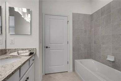 NEED A 3-CAR GARAGE? This contemporary lake view home has 4 on Babcock National Golf Course in Florida - for sale on GolfHomes.com, golf home, golf lot