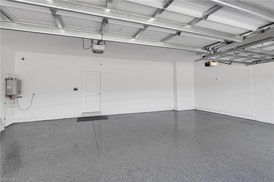 NEED A 3-CAR GARAGE? This contemporary lake view home has 4 on Babcock National Golf Course in Florida - for sale on GolfHomes.com, golf home, golf lot