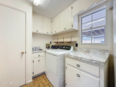 Just steps from the prestigious Timuquana Country Club, this on Timuquana Country Club in Florida - for sale on GolfHomes.com, golf home, golf lot
