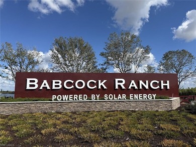 NEED A 3-CAR GARAGE? This contemporary lake view home has 4 on Babcock National Golf Course in Florida - for sale on GolfHomes.com, golf home, golf lot