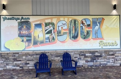 NEED A 3-CAR GARAGE? This contemporary lake view home has 4 on Babcock National Golf Course in Florida - for sale on GolfHomes.com, golf home, golf lot