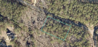 Come build your dream home on this interior wooded lot in on Reynolds Lake Oconee - The Landing in Georgia - for sale on GolfHomes.com, golf home, golf lot