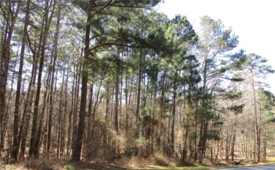 Come build your dream home on this interior wooded lot in on Reynolds Lake Oconee - The Landing in Georgia - for sale on GolfHomes.com, golf home, golf lot