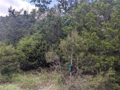 Ready to build your dream home?  Quiet and gently wooded within on Holiday Island Golf Course in Arkansas - for sale on GolfHomes.com, golf home, golf lot