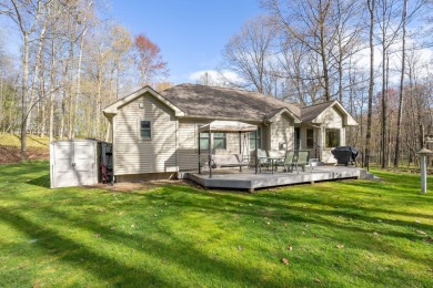 Charming ranch-style home in the heart of Canadian Lakes resort on St. Ives Golf Club in Michigan - for sale on GolfHomes.com, golf home, golf lot