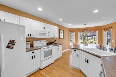 Charming ranch-style home in the heart of Canadian Lakes resort on St. Ives Golf Club in Michigan - for sale on GolfHomes.com, golf home, golf lot