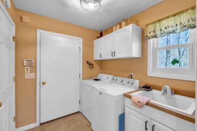 Charming ranch-style home in the heart of Canadian Lakes resort on St. Ives Golf Club in Michigan - for sale on GolfHomes.com, golf home, golf lot