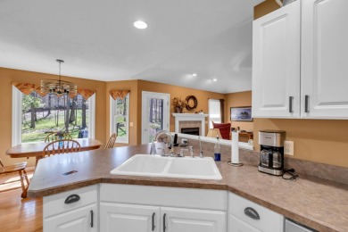 Charming ranch-style home in the heart of Canadian Lakes resort on St. Ives Golf Club in Michigan - for sale on GolfHomes.com, golf home, golf lot