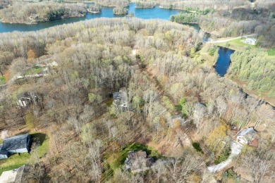 Charming ranch-style home in the heart of Canadian Lakes resort on St. Ives Golf Club in Michigan - for sale on GolfHomes.com, golf home, golf lot