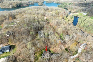Charming ranch-style home in the heart of Canadian Lakes resort on St. Ives Golf Club in Michigan - for sale on GolfHomes.com, golf home, golf lot