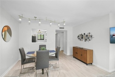 Peaceful and tranquil living comes to mind when you enter this on Miles Grant Country Club in Florida - for sale on GolfHomes.com, golf home, golf lot