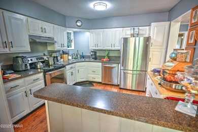 Privacy, Location, and Amazing Setting! Nestled on a level lot on Paupack Hills Golf and Country Club in Pennsylvania - for sale on GolfHomes.com, golf home, golf lot