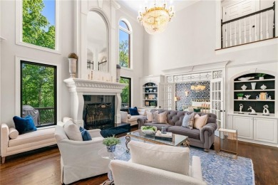 Experience resort-style living on over an acre in this stunning on Alpharetta Athletic Club East in Georgia - for sale on GolfHomes.com, golf home, golf lot