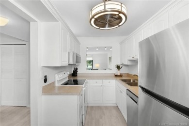 Peaceful and tranquil living comes to mind when you enter this on Miles Grant Country Club in Florida - for sale on GolfHomes.com, golf home, golf lot