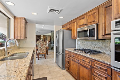 Beautifully situated in the highly desirable Oro Valley Country on Oro Valley Country Club in Arizona - for sale on GolfHomes.com, golf home, golf lot