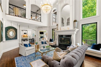 Experience resort-style living on over an acre in this stunning on Alpharetta Athletic Club East in Georgia - for sale on GolfHomes.com, golf home, golf lot