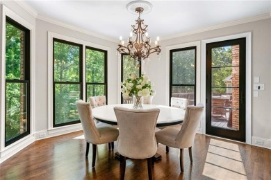 Experience resort-style living on over an acre in this stunning on Alpharetta Athletic Club East in Georgia - for sale on GolfHomes.com, golf home, golf lot