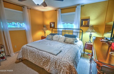 Privacy, Location, and Amazing Setting! Nestled on a level lot on Paupack Hills Golf and Country Club in Pennsylvania - for sale on GolfHomes.com, golf home, golf lot