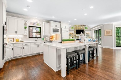 Experience resort-style living on over an acre in this stunning on Alpharetta Athletic Club East in Georgia - for sale on GolfHomes.com, golf home, golf lot