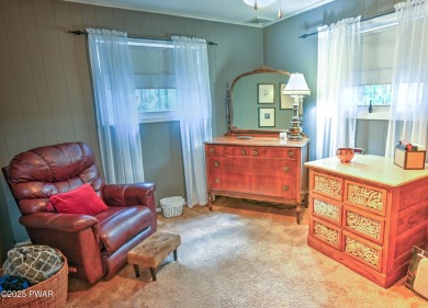 Privacy, Location, and Amazing Setting! Nestled on a level lot on Paupack Hills Golf and Country Club in Pennsylvania - for sale on GolfHomes.com, golf home, golf lot