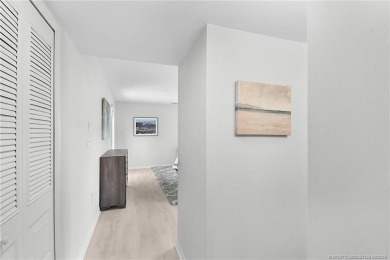 Peaceful and tranquil living comes to mind when you enter this on Miles Grant Country Club in Florida - for sale on GolfHomes.com, golf home, golf lot