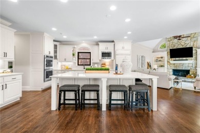 Experience resort-style living on over an acre in this stunning on Alpharetta Athletic Club East in Georgia - for sale on GolfHomes.com, golf home, golf lot