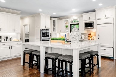 Experience resort-style living on over an acre in this stunning on Alpharetta Athletic Club East in Georgia - for sale on GolfHomes.com, golf home, golf lot