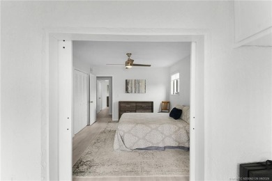 Peaceful and tranquil living comes to mind when you enter this on Miles Grant Country Club in Florida - for sale on GolfHomes.com, golf home, golf lot