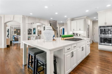 Experience resort-style living on over an acre in this stunning on Alpharetta Athletic Club East in Georgia - for sale on GolfHomes.com, golf home, golf lot