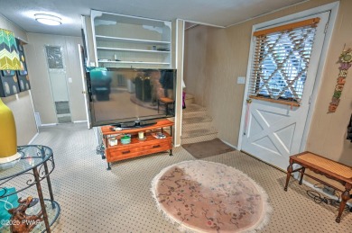 Privacy, Location, and Amazing Setting! Nestled on a level lot on Paupack Hills Golf and Country Club in Pennsylvania - for sale on GolfHomes.com, golf home, golf lot