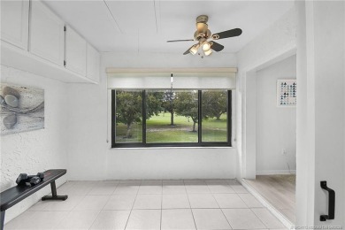 Peaceful and tranquil living comes to mind when you enter this on Miles Grant Country Club in Florida - for sale on GolfHomes.com, golf home, golf lot