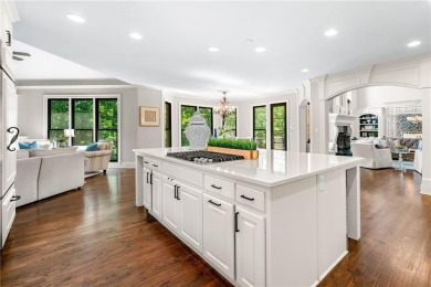 Experience resort-style living on over an acre in this stunning on Alpharetta Athletic Club East in Georgia - for sale on GolfHomes.com, golf home, golf lot