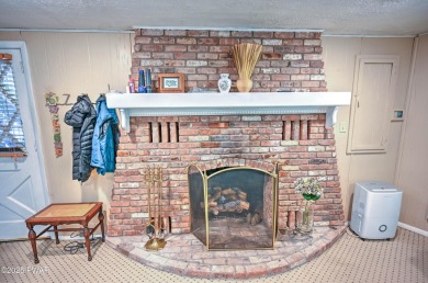 Privacy, Location, and Amazing Setting! Nestled on a level lot on Paupack Hills Golf and Country Club in Pennsylvania - for sale on GolfHomes.com, golf home, golf lot