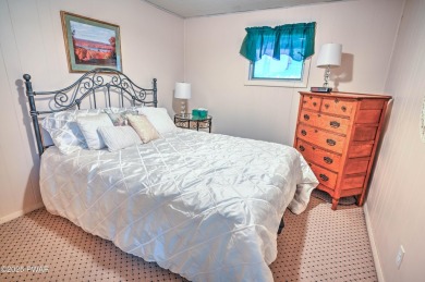 Privacy, Location, and Amazing Setting! Nestled on a level lot on Paupack Hills Golf and Country Club in Pennsylvania - for sale on GolfHomes.com, golf home, golf lot
