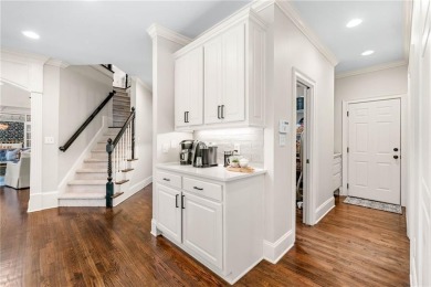 Experience resort-style living on over an acre in this stunning on Alpharetta Athletic Club East in Georgia - for sale on GolfHomes.com, golf home, golf lot