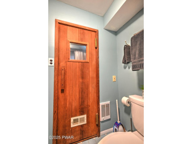 Privacy, Location, and Amazing Setting! Nestled on a level lot on Paupack Hills Golf and Country Club in Pennsylvania - for sale on GolfHomes.com, golf home, golf lot