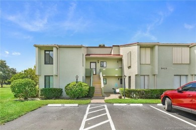 Peaceful and tranquil living comes to mind when you enter this on Miles Grant Country Club in Florida - for sale on GolfHomes.com, golf home, golf lot