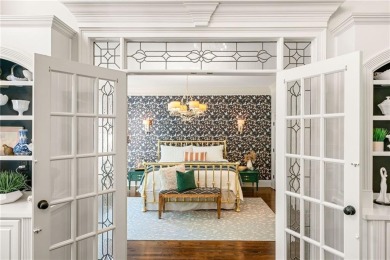 Experience resort-style living on over an acre in this stunning on Alpharetta Athletic Club East in Georgia - for sale on GolfHomes.com, golf home, golf lot