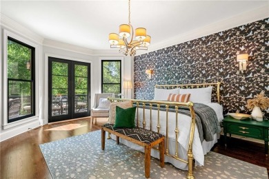 Experience resort-style living on over an acre in this stunning on Alpharetta Athletic Club East in Georgia - for sale on GolfHomes.com, golf home, golf lot