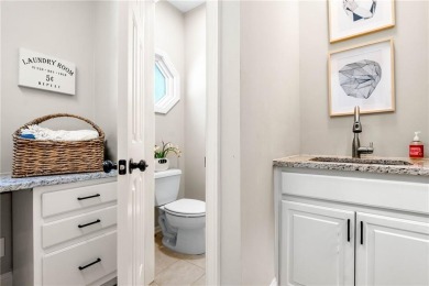 Experience resort-style living on over an acre in this stunning on Alpharetta Athletic Club East in Georgia - for sale on GolfHomes.com, golf home, golf lot