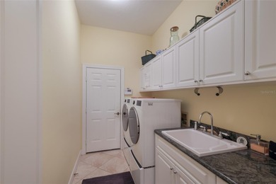 Under contract-accepting backup offers. Exquisite Laurel Oak on Laurel Oak Country Club in Florida - for sale on GolfHomes.com, golf home, golf lot