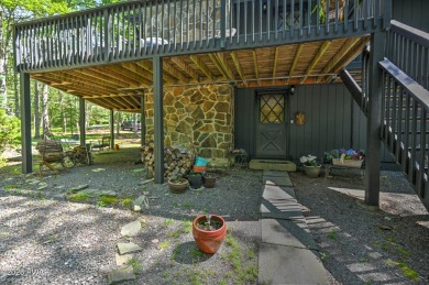 Privacy, Location, and Amazing Setting! Nestled on a level lot on Paupack Hills Golf and Country Club in Pennsylvania - for sale on GolfHomes.com, golf home, golf lot