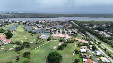 Peaceful and tranquil living comes to mind when you enter this on Miles Grant Country Club in Florida - for sale on GolfHomes.com, golf home, golf lot