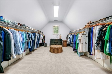 Experience resort-style living on over an acre in this stunning on Alpharetta Athletic Club East in Georgia - for sale on GolfHomes.com, golf home, golf lot